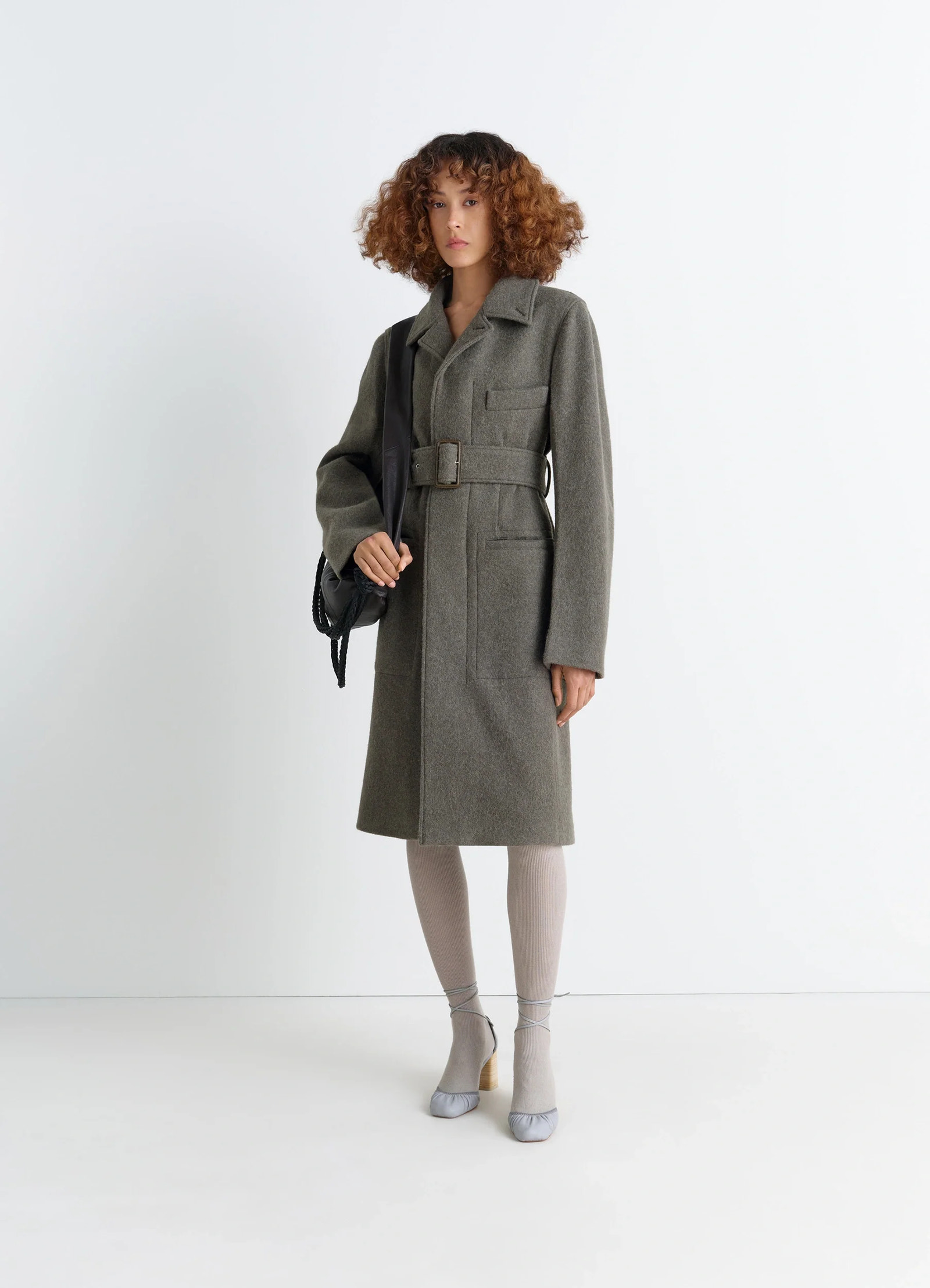 Belted tailored coat in wool and alpaca blend, model shot, front view fitted with belt
