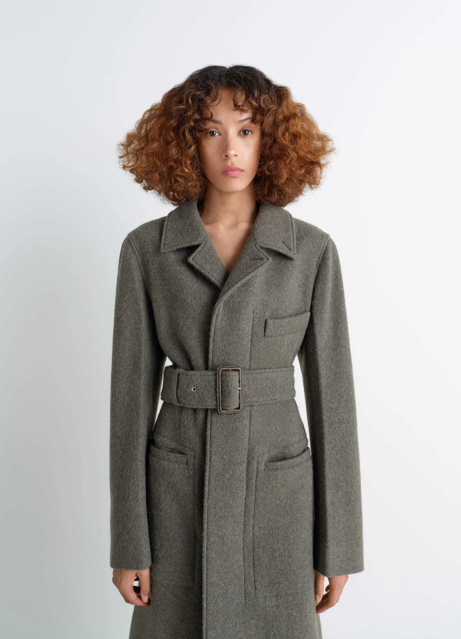 Belted tailored coat in wool and alpaca blend, model shot, 3/4 front view notched lapel, large buckle