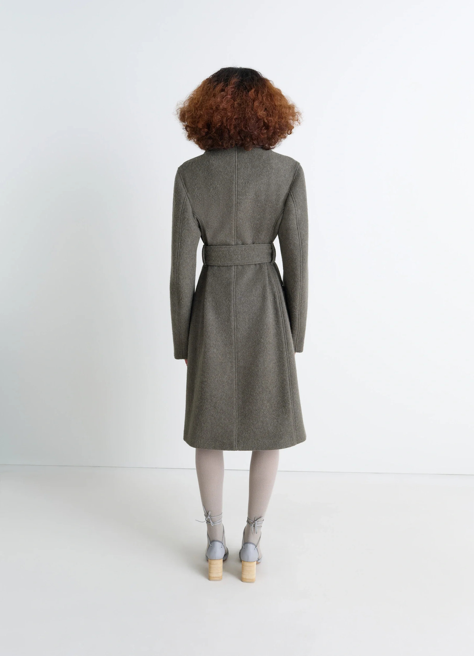 Belted tailored coat in wool and alpaca blend, model shot, back view long back seam