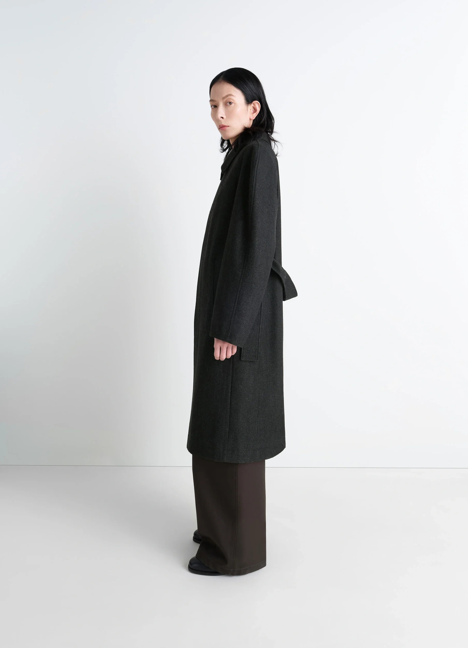 Lemaire raglan sleeve coat in rws wool cotton twill, model shot, side view long straight silhouette