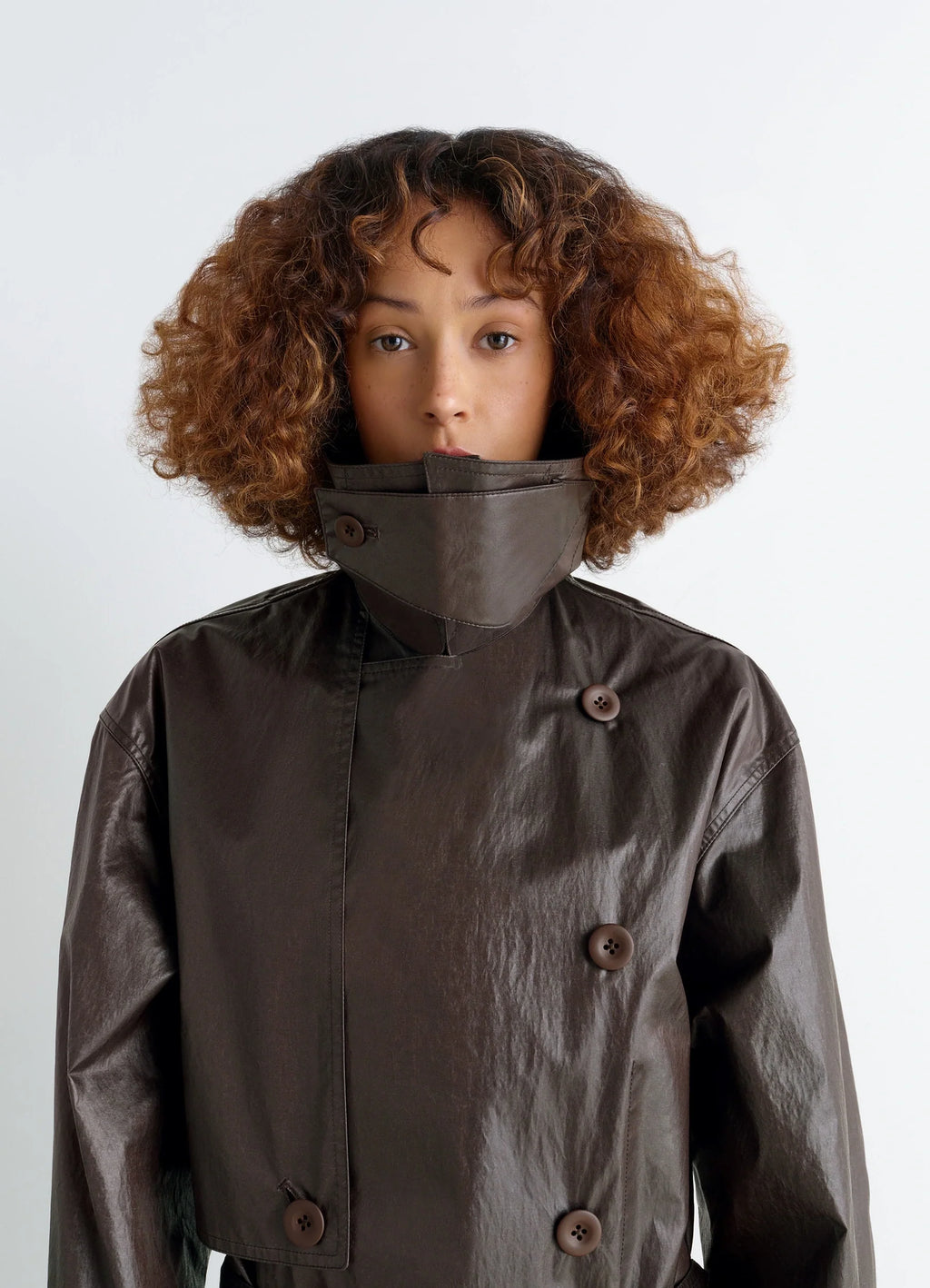 Oversized Trench Coat in Metallic Coated Cotton, model shot, portrait close-up high collar buttoned