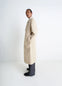 Ventile Trench Coat in Beige Ventile Cotton, model shot, Side view Relaxed fit