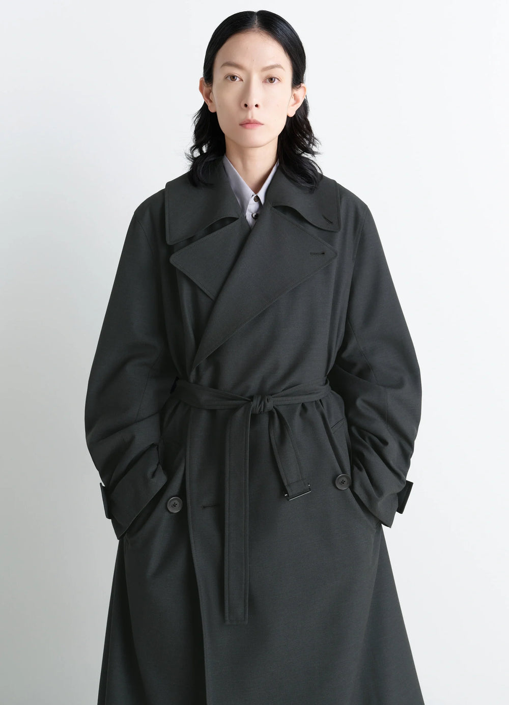 Lemaire Trench Coat in Tropical Wool-Blend, model shot, waist-up portrait view belted waist detail