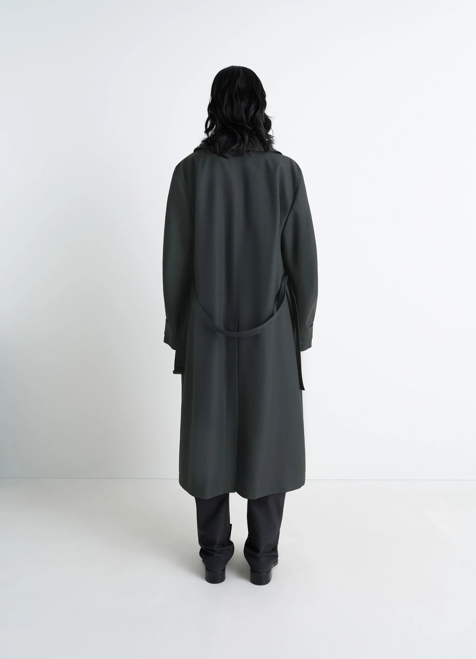 Lemaire trench coat in tropical wool-blend, model shot, back view straight hem, long silhouette