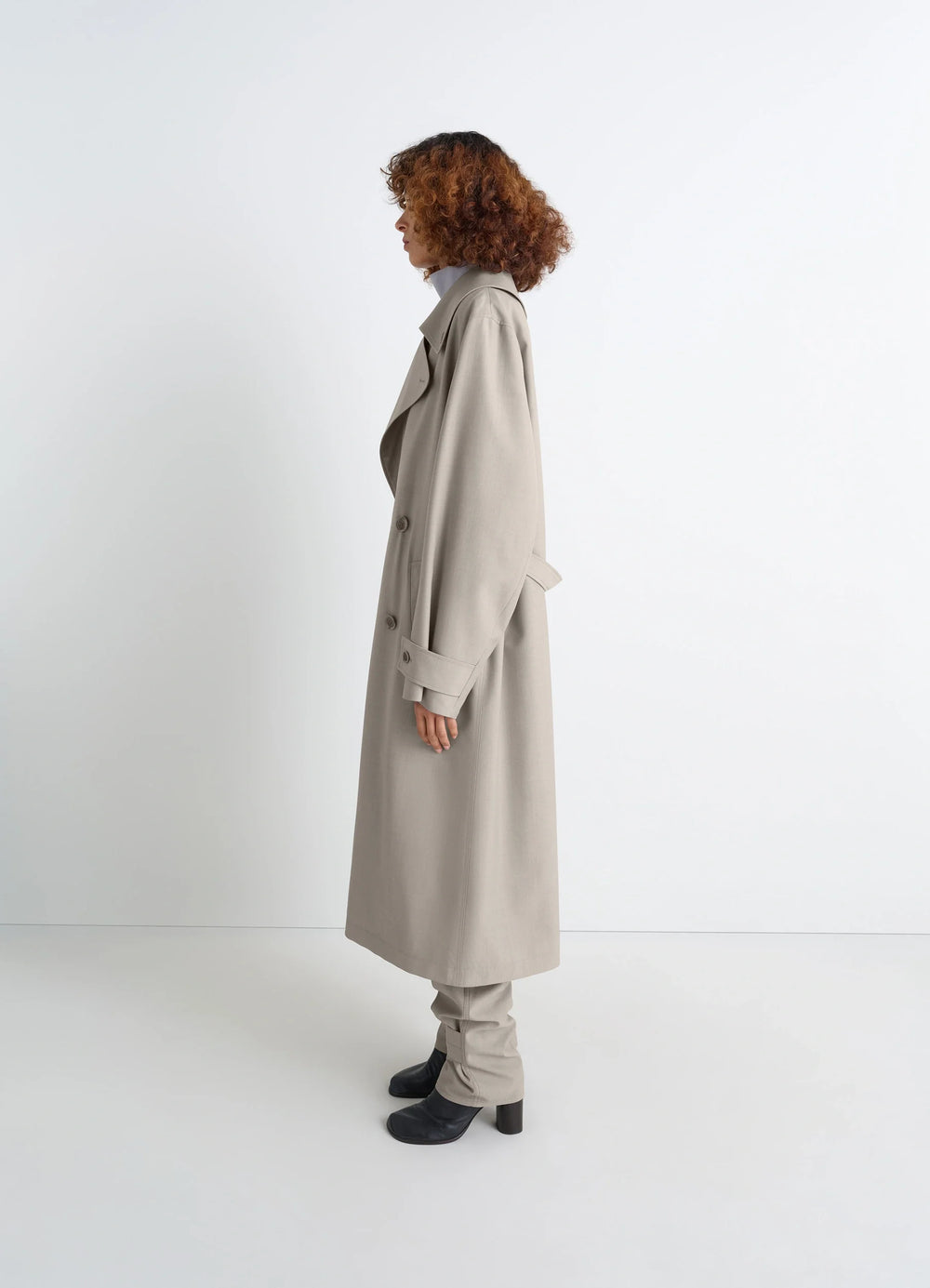 Lemaire Trench Coat in Tropical Wool-Blend Mottled, model shot, side view buttoned cuffs