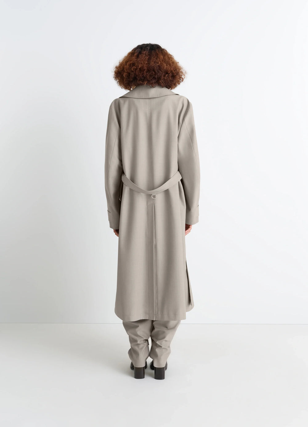 Lemaire Trench Coat in Tropical Wool-Blend Mottled, model shot, back view belted back, vented hem
