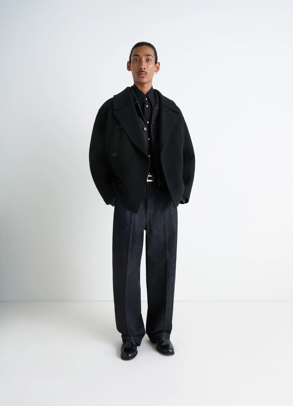 Lemaire Boxy Peacoat in Black Double-Faced Wool, model shot, full body front view oversized fit, wide sleeves