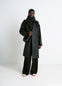 Hooded Raincoat in Water-repellent Resinated Cotton, model shot, Front view Oversized fit with pockets