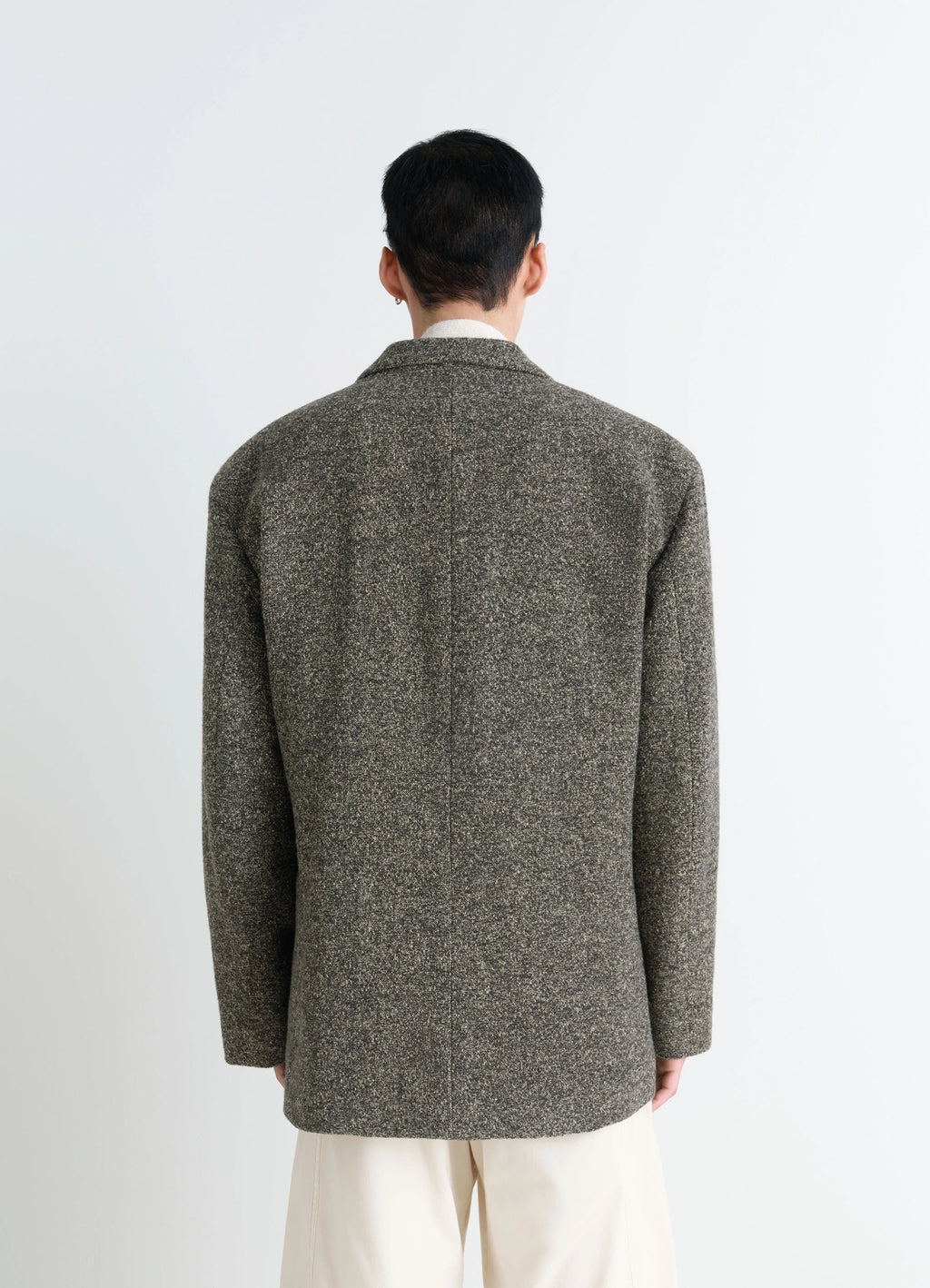 Short Double Breasted Coat in Mottled Wool Tweed, model shot, back view textured tweed pattern