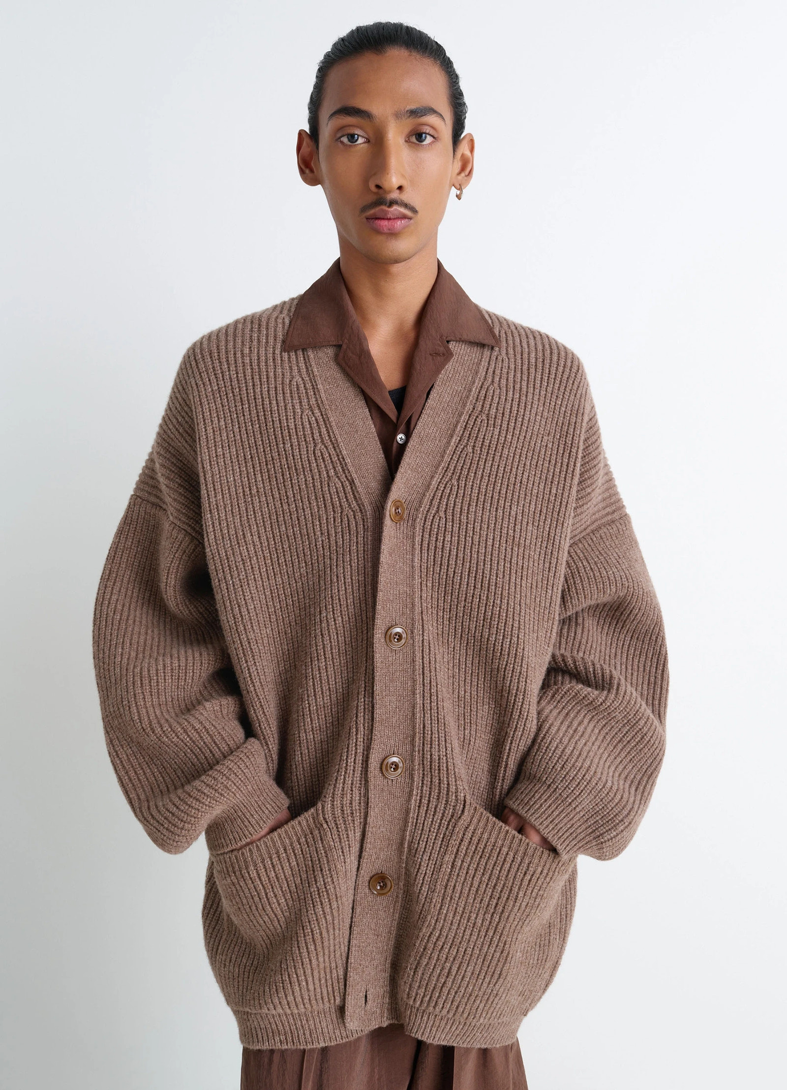 Cardicoat in brown shetland wool, model shot, half-body view dropped shoulder