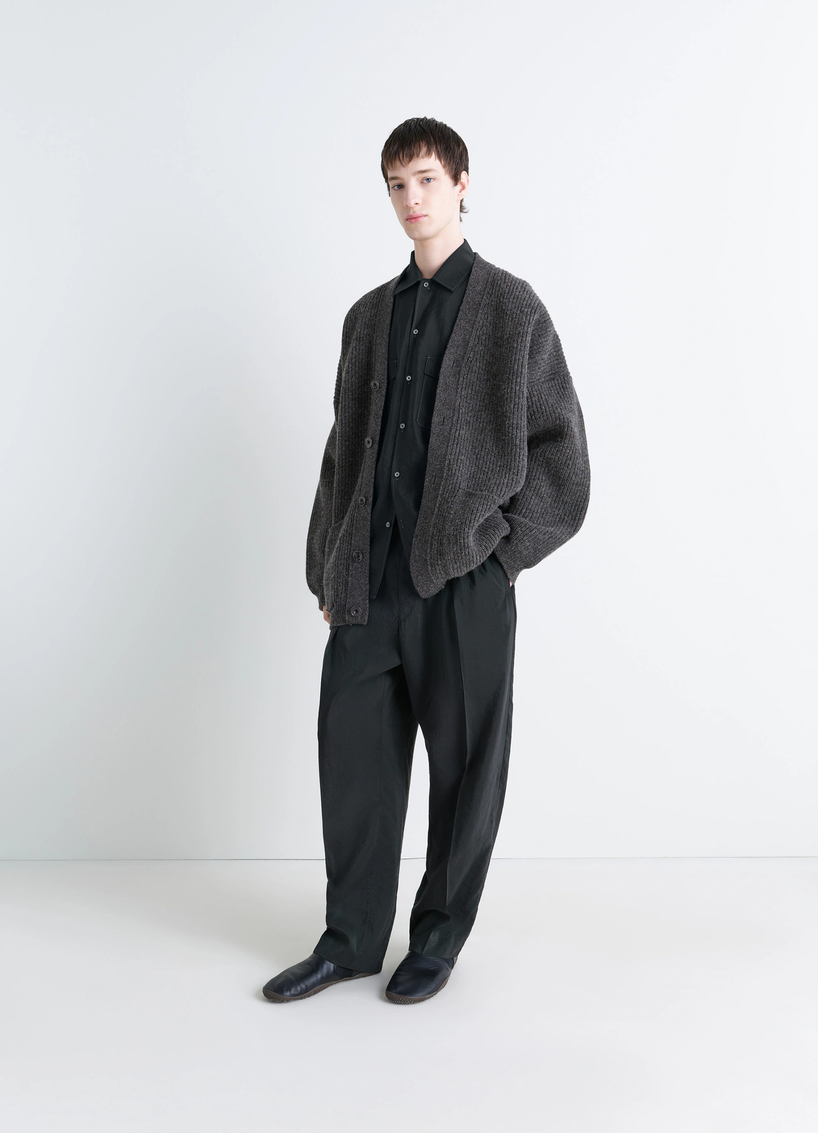 Ribbed shetland wool cardicoat in dark heather shetland wool, model shot, front view dropped shoulders