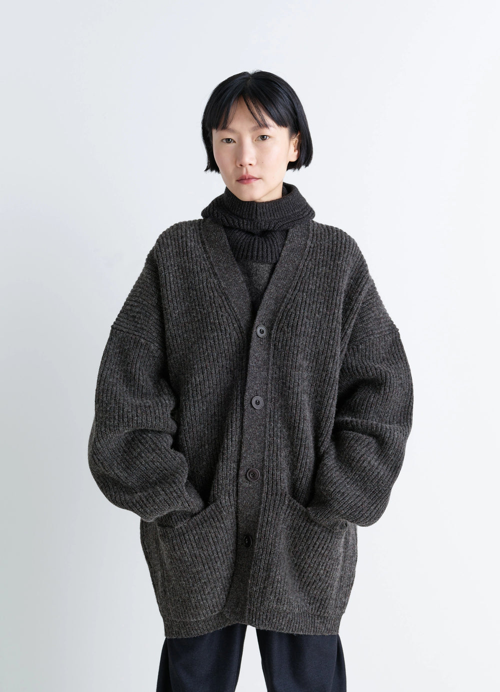 Ribbed Shetland Wool Cardicoat in Dark Heather Shetland Wool, model shot, close-up front view deep V-neck, large buttons