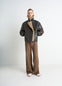 Shearling Coat in Contrasting Leather Trim, model shot, Front View Generous Collar Metal Buckle