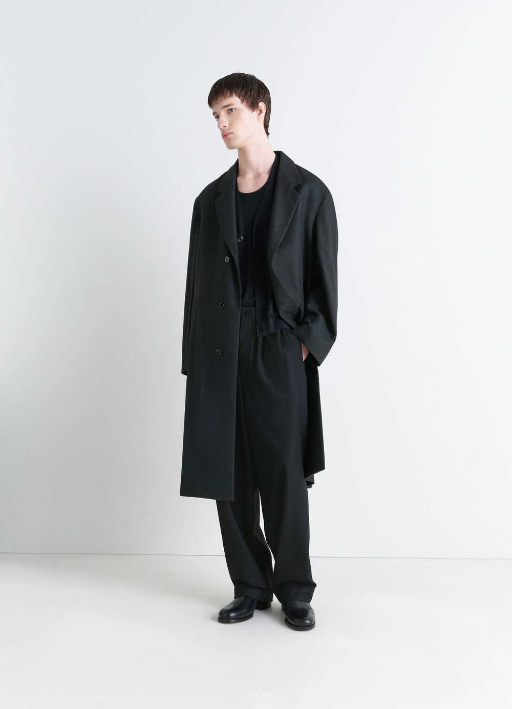 Lemaire Soft Chesterfield Coat in Light Cashmere-Blend, model shot, three-quarter view draped open