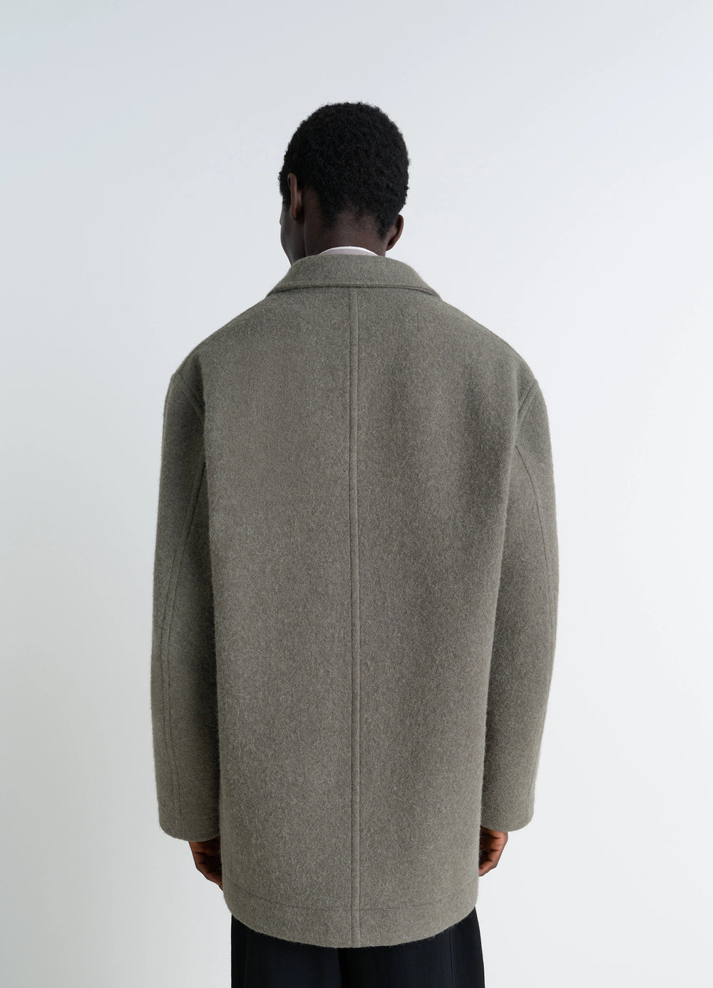Lemaire Felt Wool Jacket in Olive Wool and Alpaca, model shot, back view oversized unlined back seam