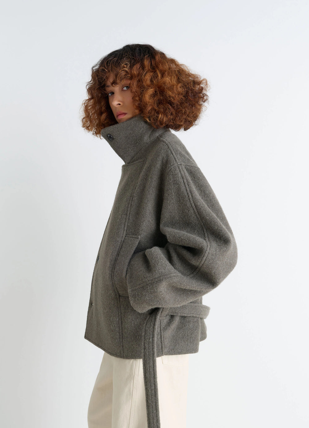 Short Asymmetrical Bathrobe Coat in Wool-Alpaca Blend, model shot, three-quarter view high collar, belted waist