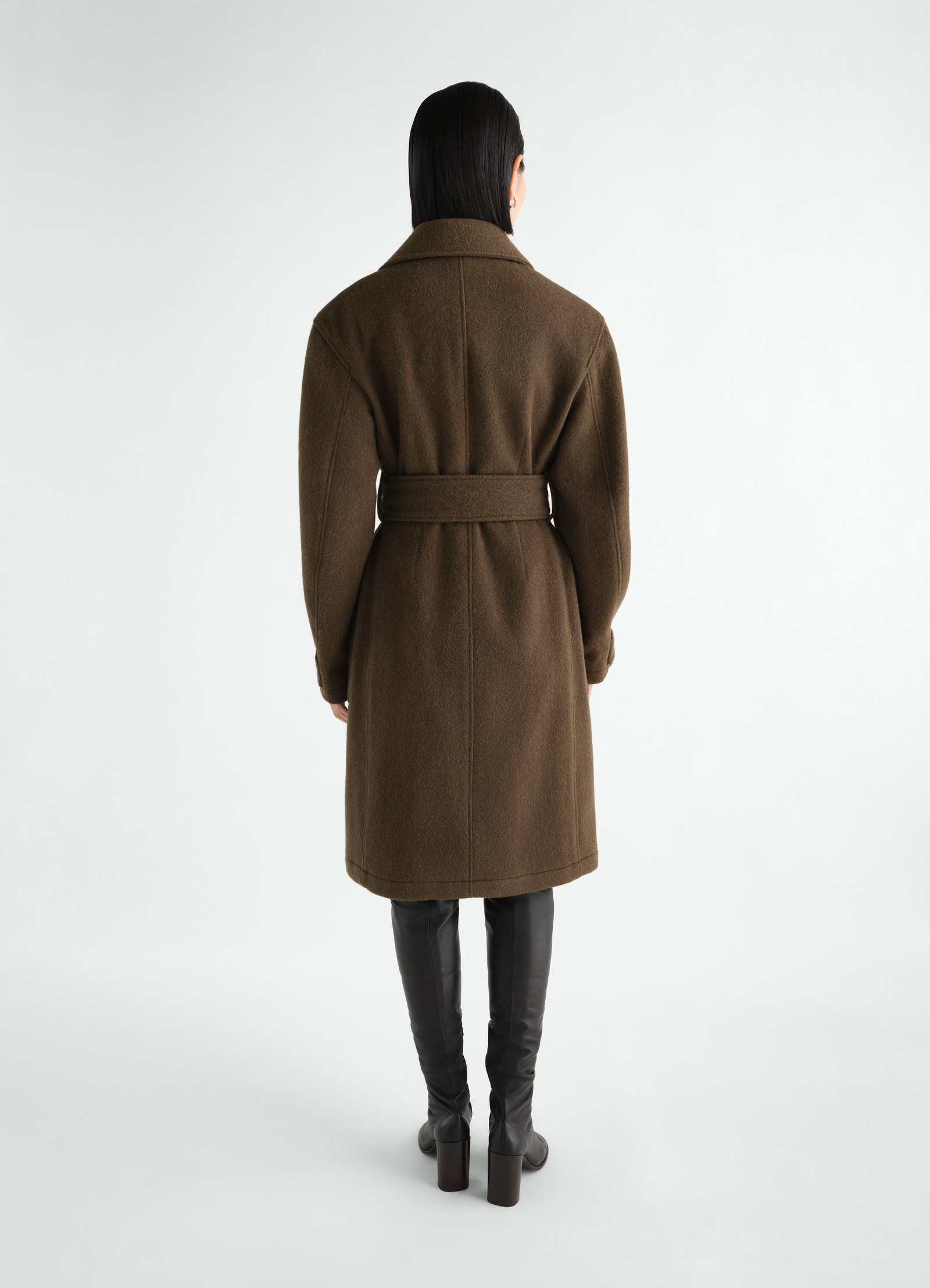Fitted wrap coat in brown felted wool alpaca blend by lemaire worn by model back view