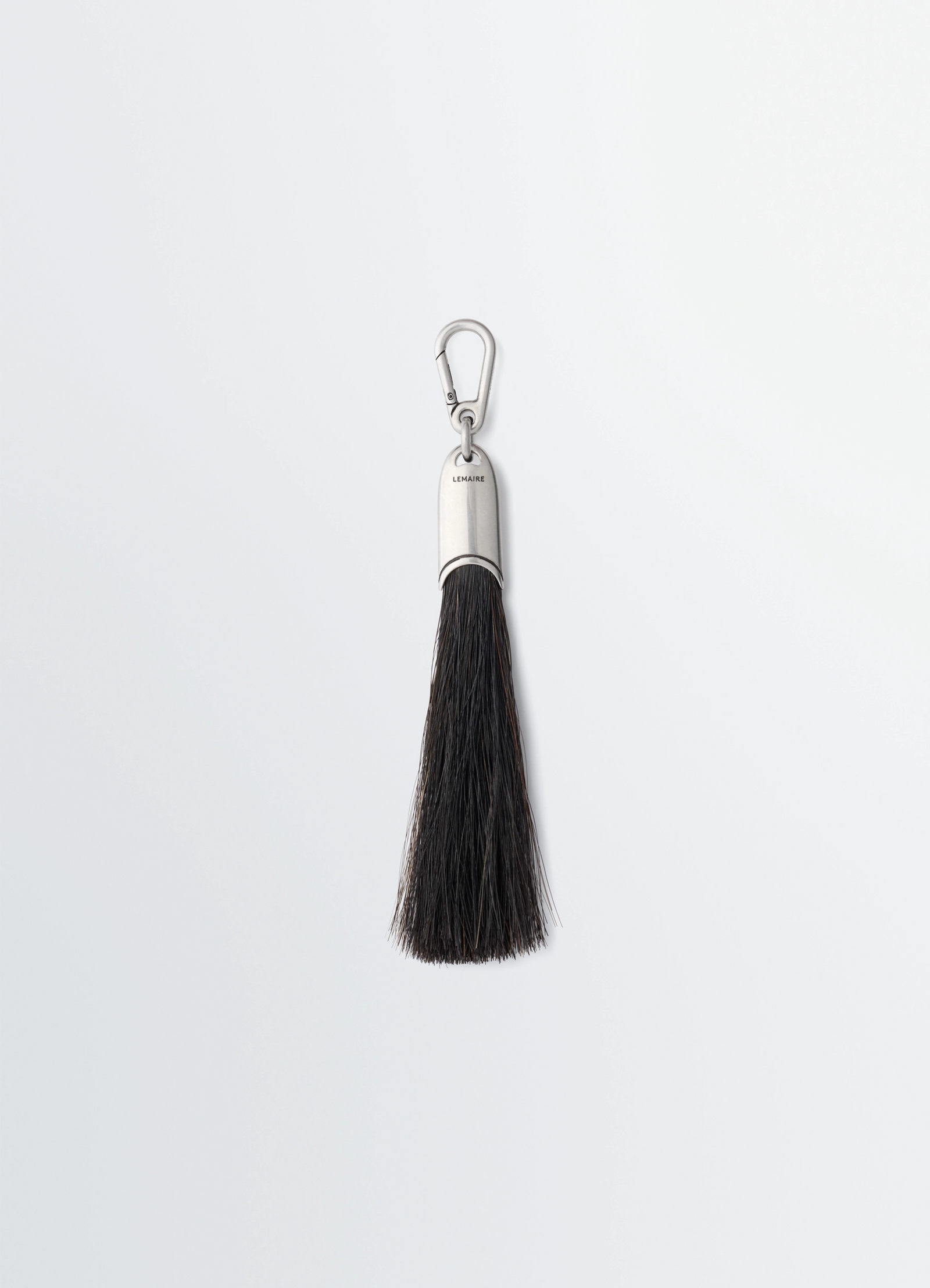Maxi brush bag charm in horsehair, product shot, front view brass carabiner feature