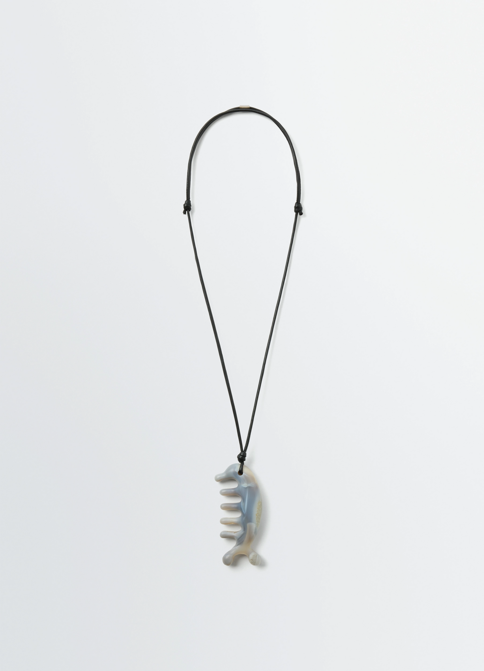 Beluga gua sha necklace in agate, product shot, front view sculptural design