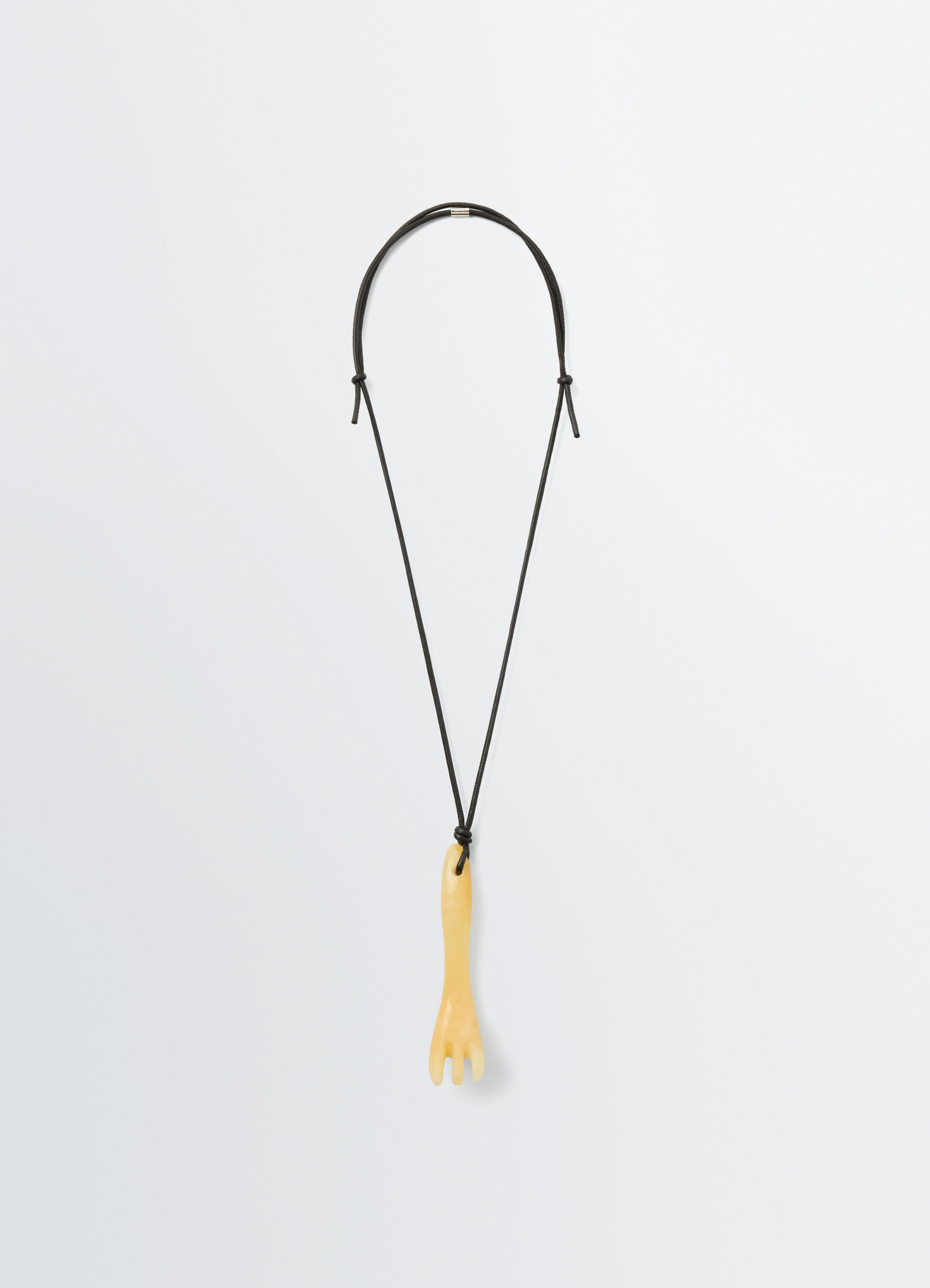 Gua sha fork necklace in aragonite, product shot, front view hanging fork shape