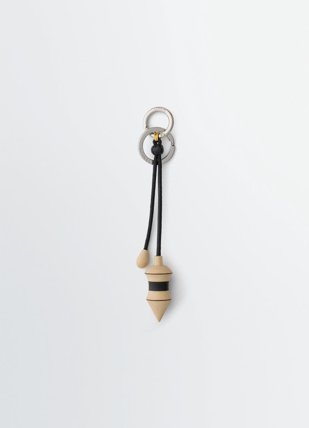 Pendulum Bag Charm in Black Stripes Wood, product shot, Front view Carabiner attachment