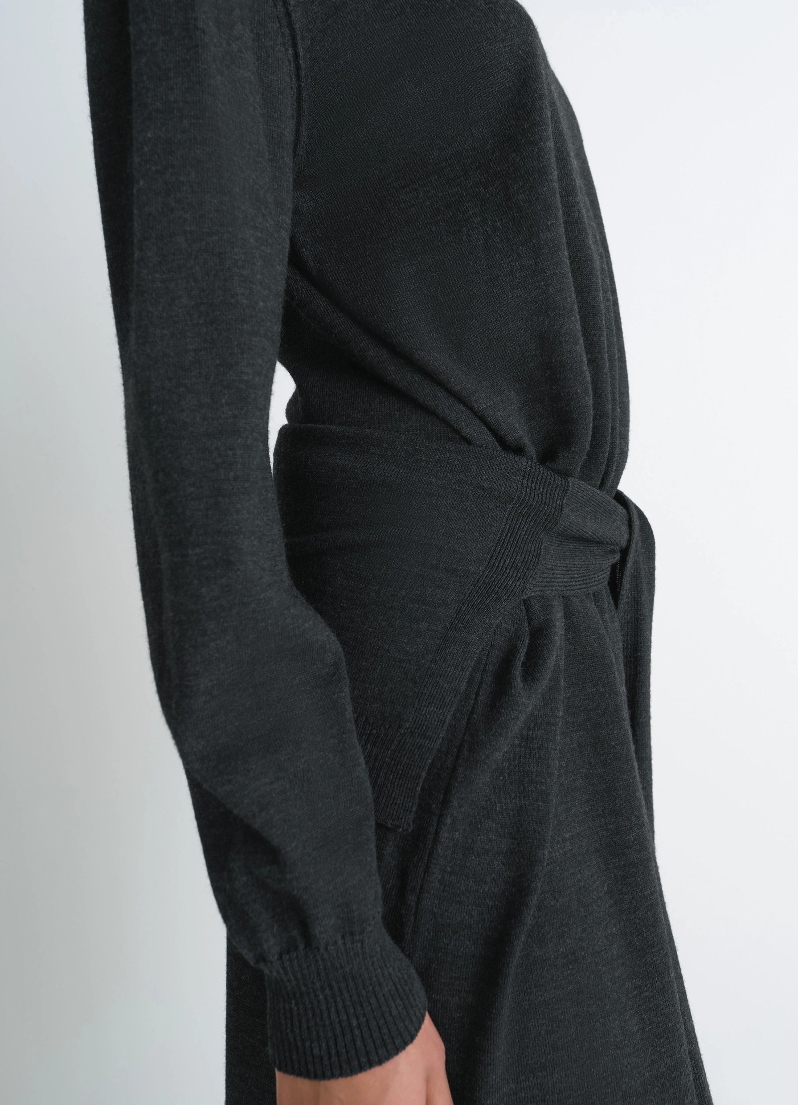 Lemaire trompe loeil dress in dark merino wool blend, model shot, close-up side detail waist tie sweater detail