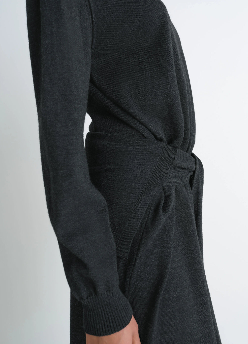 Lemaire Trompe LOeil Dress in Dark Merino Wool Blend, model shot, close-up side detail waist tie sweater detail