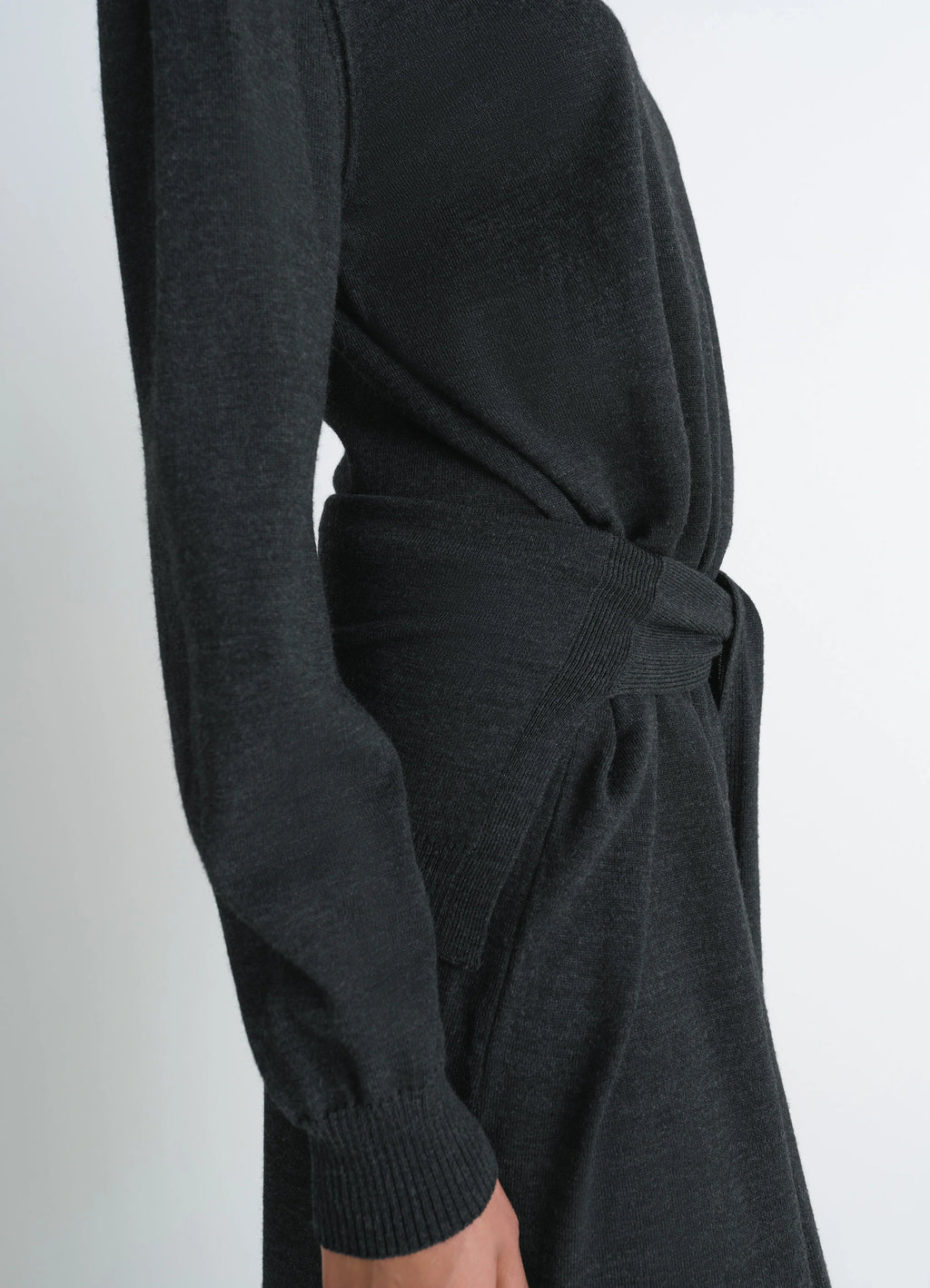 Lemaire Trompe LOeil Dress in Dark Merino Wool Blend, model shot, close-up side detail waist tie sweater detail