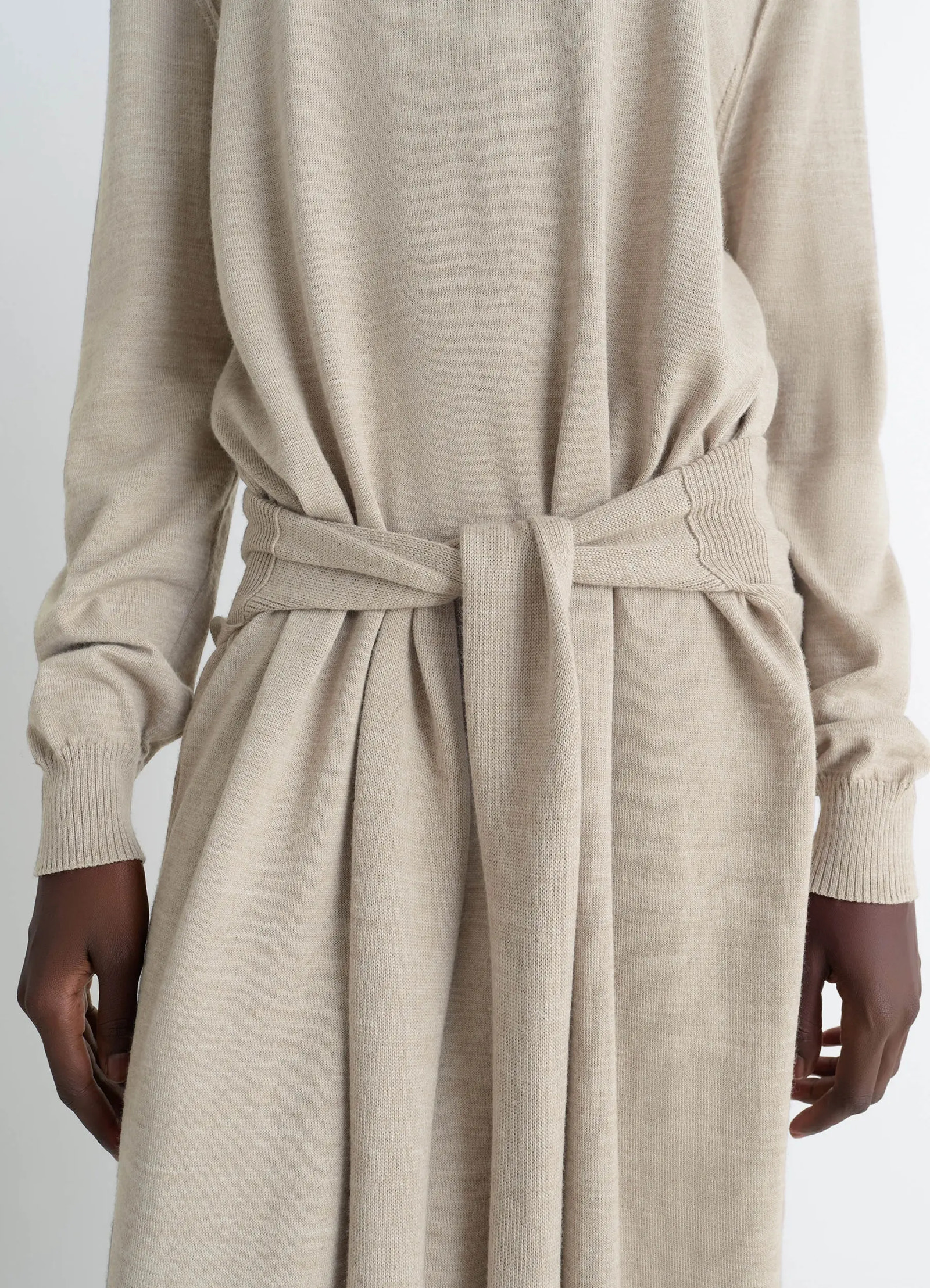 Lemaire trompe lœil dress in beige merino wool blend, model shot, close-up detail shot tie-around waistband
