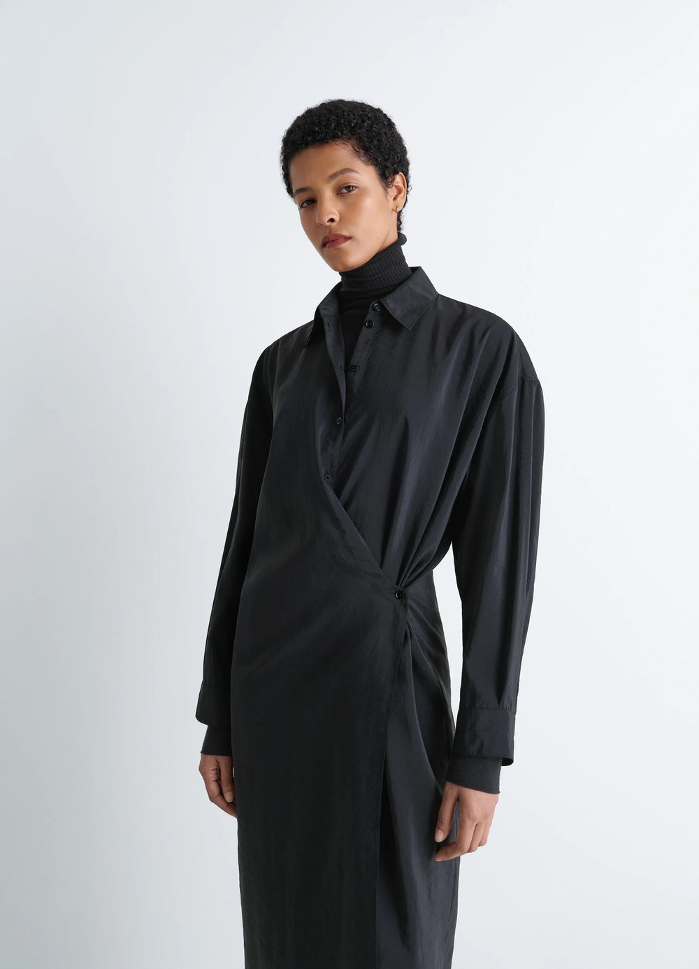 Lemaire Straight Collar Twisted Dre in Black Dry Silk Blend, model shot, three-quarter view draped front crossover