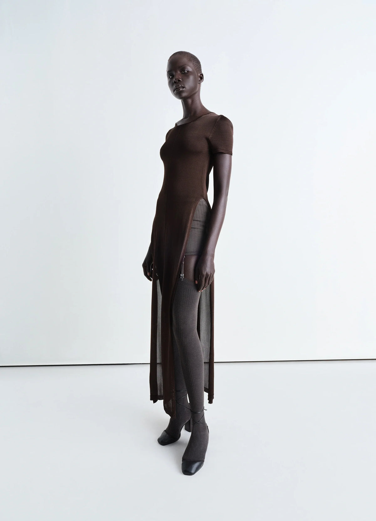 Lemaire Column Dress with Slits in Shiny viscose in brown, model shot, Three-quarter side view Short sleeved with long slits