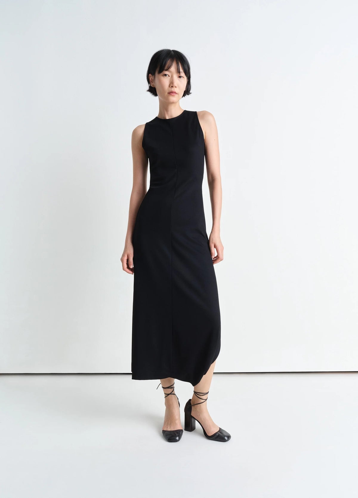 Twisted Hem Dress in Black Viscose Silk, model shot, Front view Fitted sleeveless cut