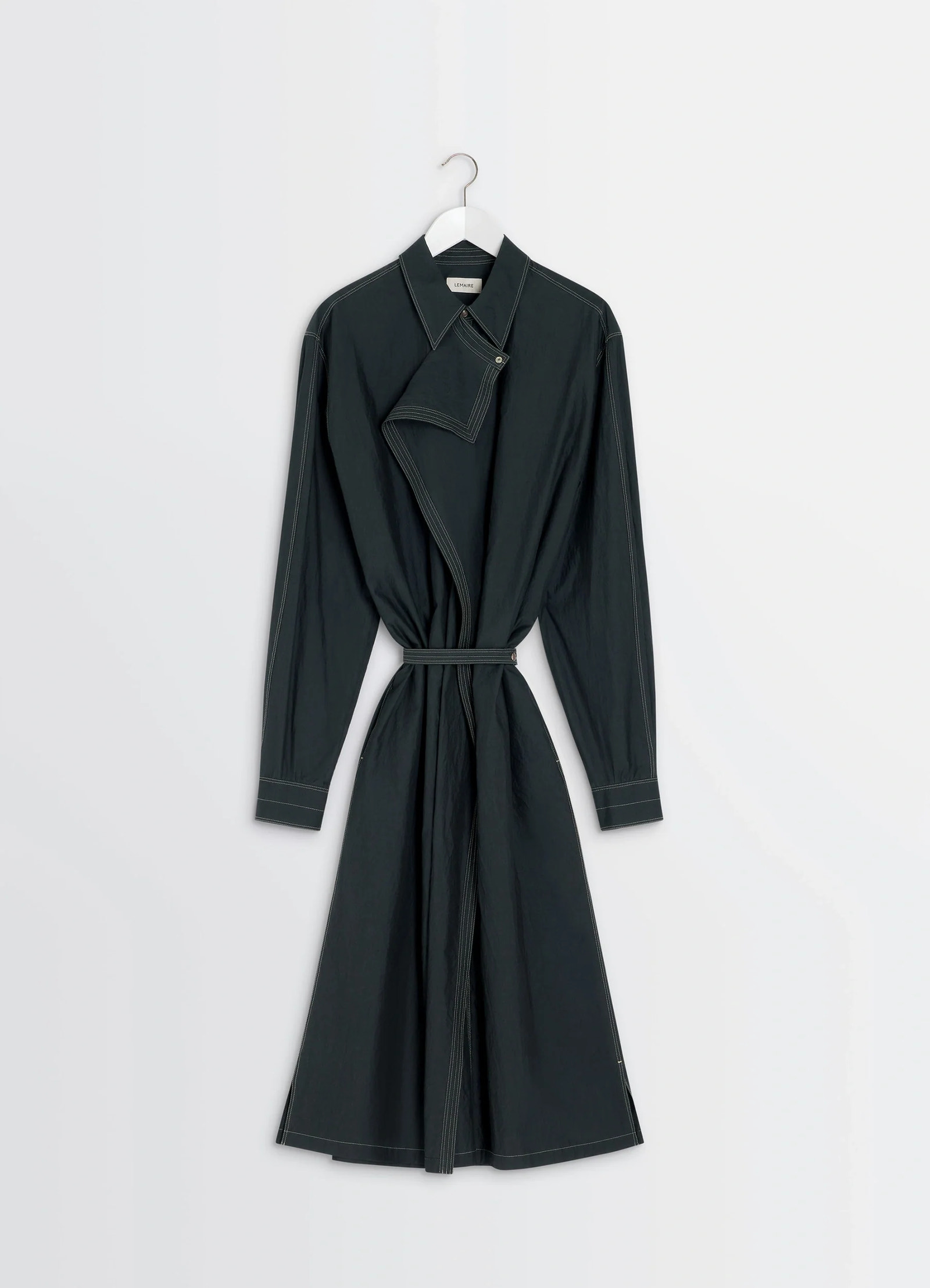 Asymmetrical shirt dress in black cotton crepe, product shot, hanging front view folded collar detail