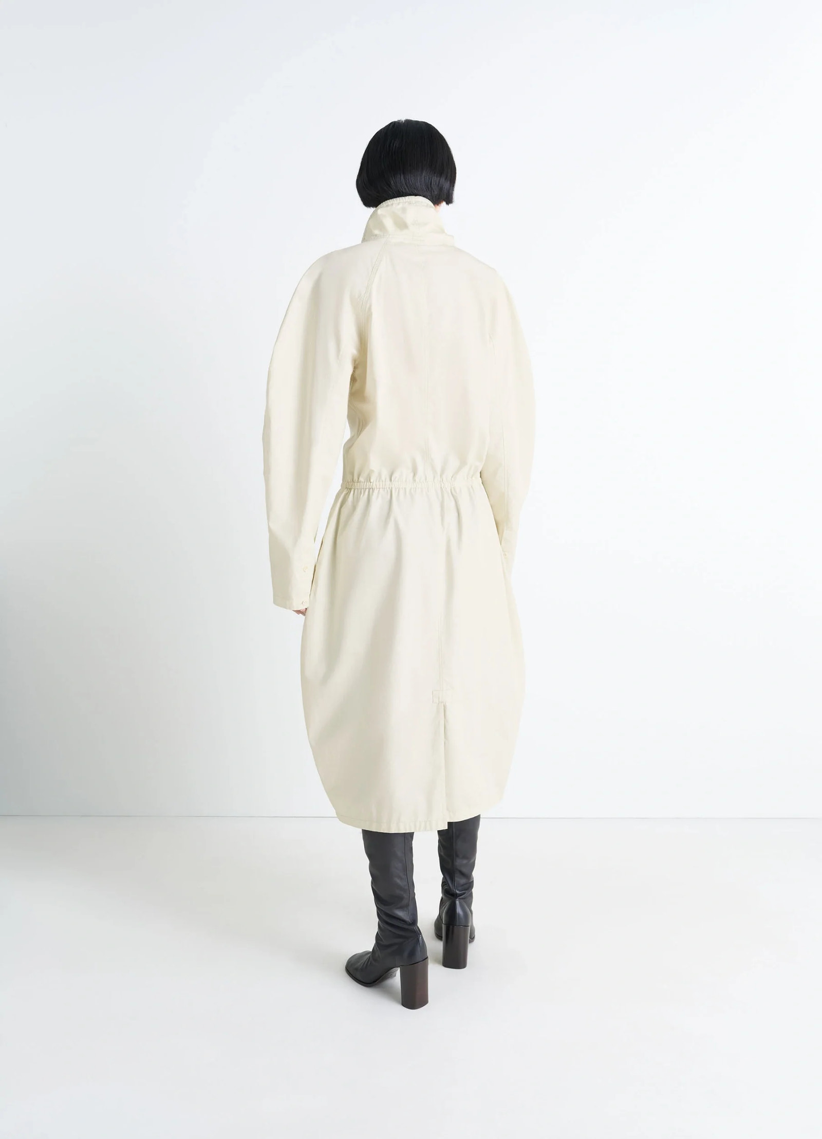 Lemaire vareuse dress in lightweight cotton satin, model shot, back view raglan sleeves and gathered waistba