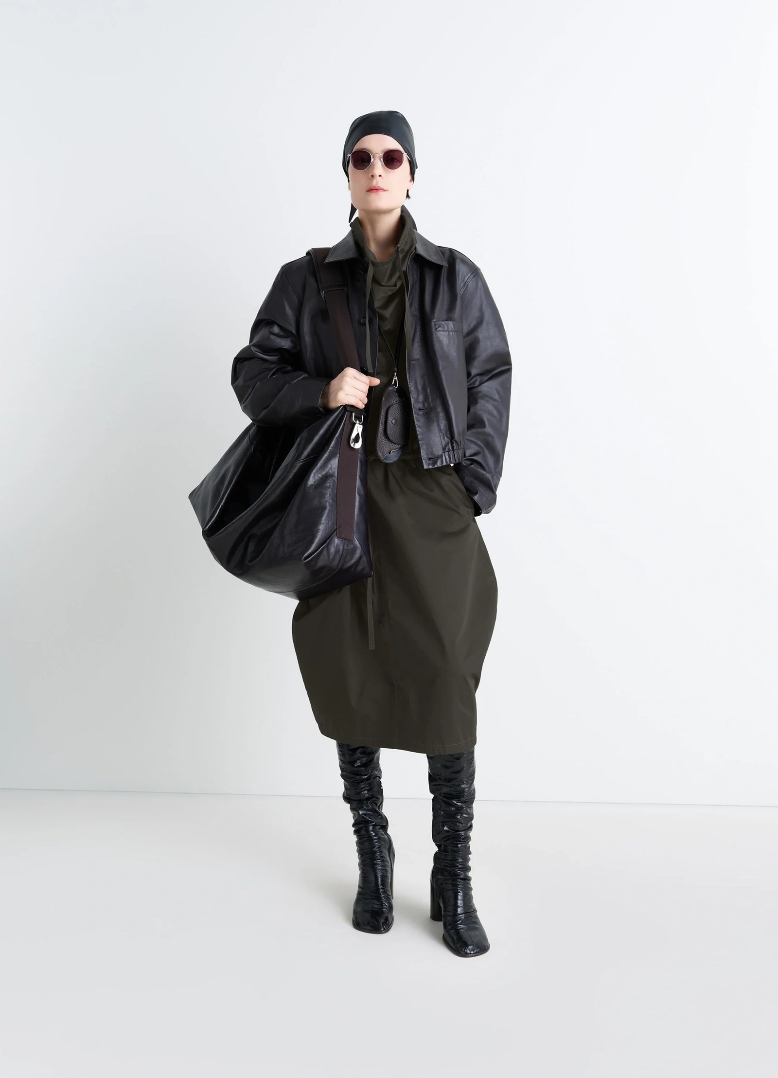 Lemaire vareuse dress in olive lightweight cotton, model shot, front view workwear-inspired cut