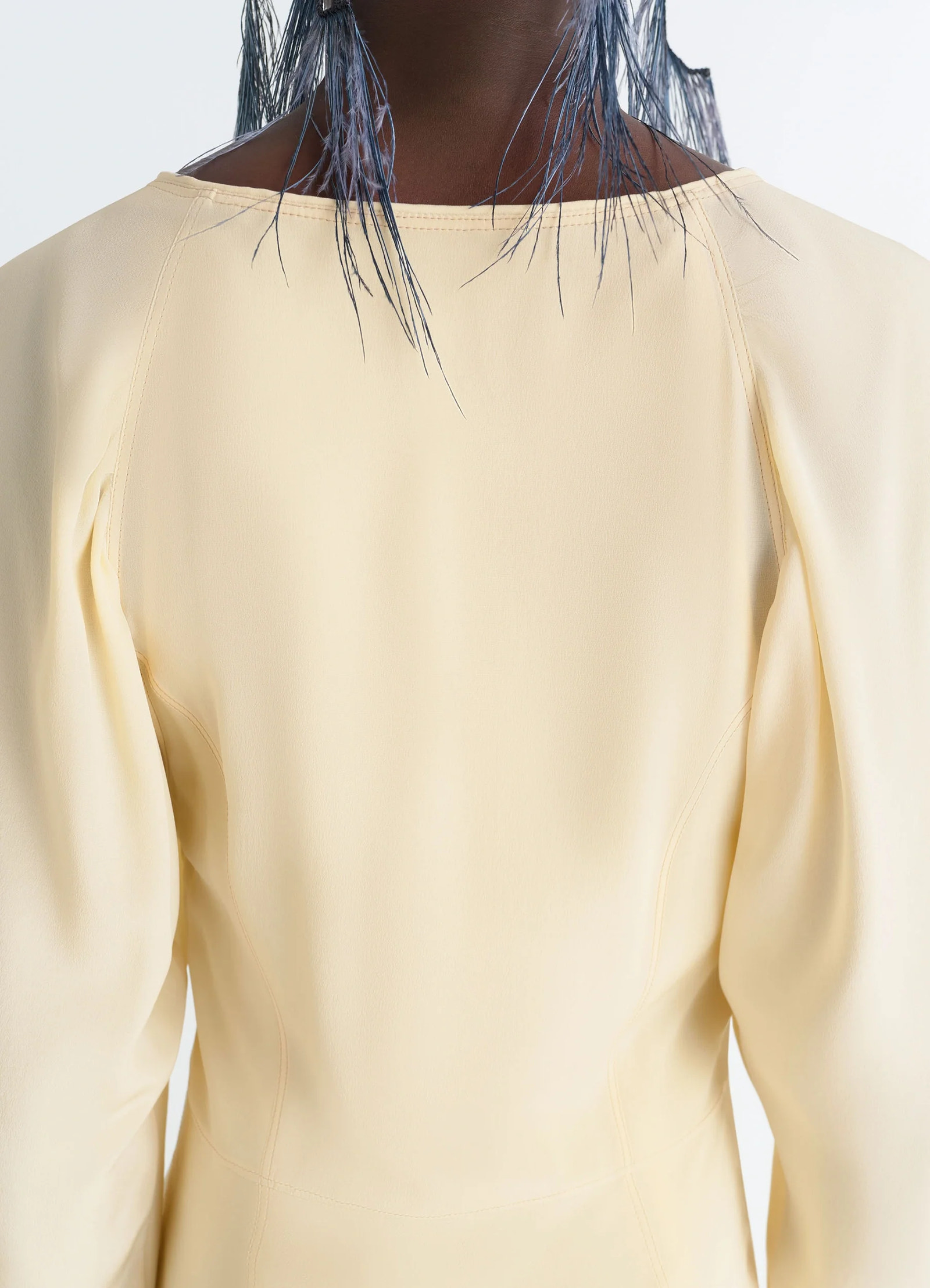 Bias cut dress in silk crepe de chine, model shot, upper back close-up seam detail puff shoulder