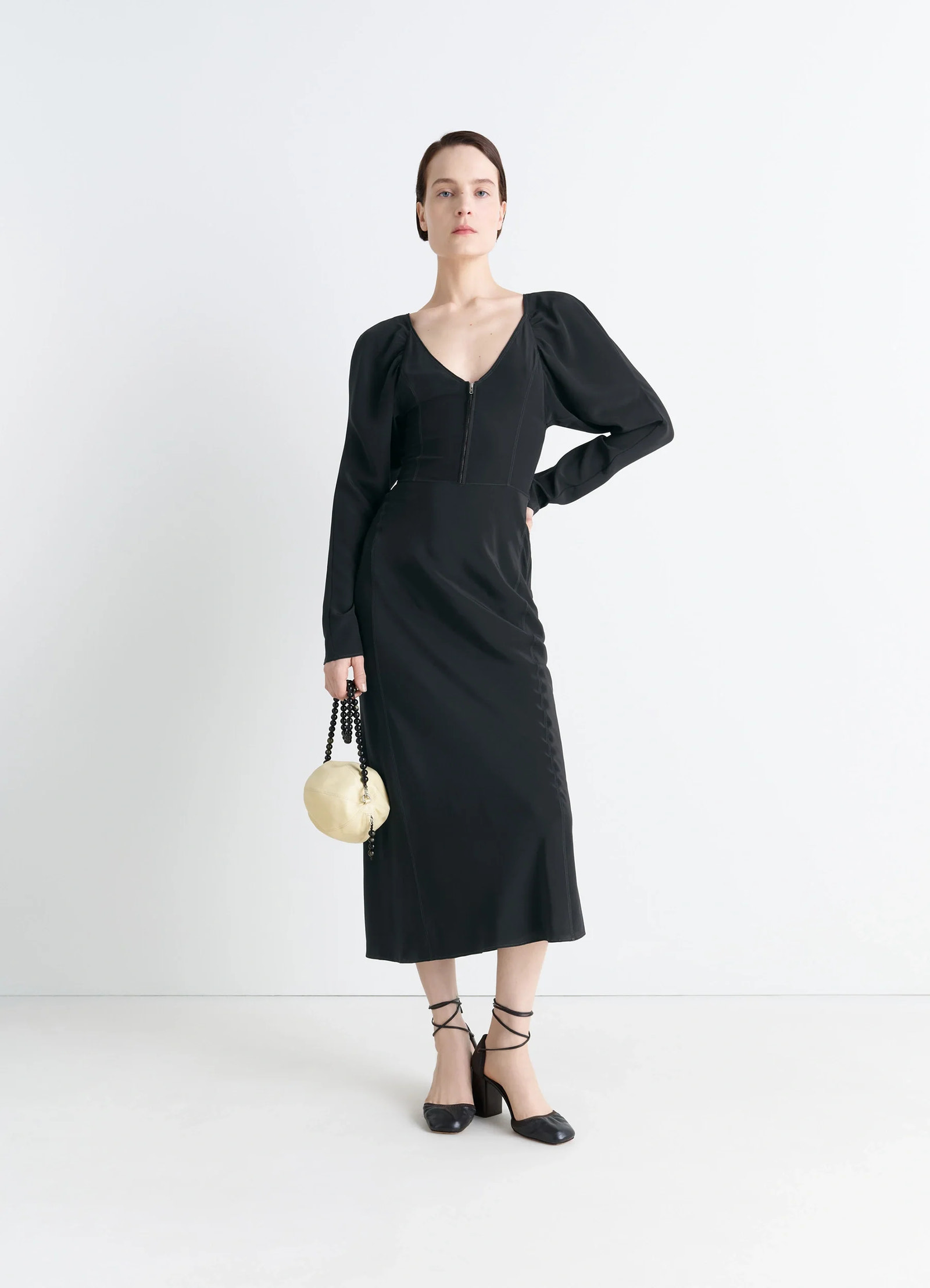 Bias cut dress in black silk crepe de chine, model shot, front view body-hugging bias cut