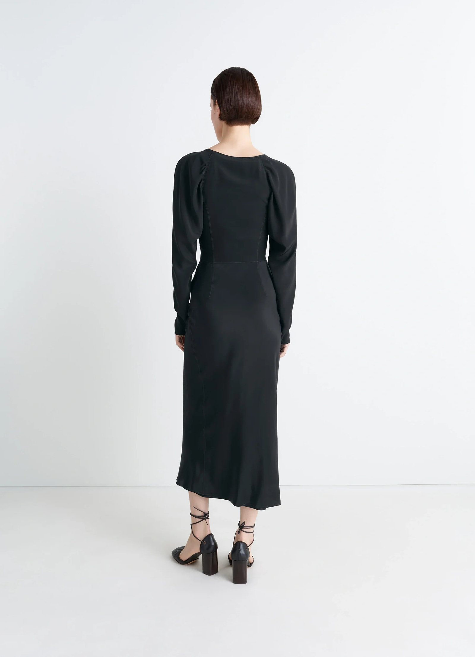Bias cut dress in black silk crepe de chine, model shot, back detail view gathered shoulder seams