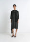 Blouse Dress with Pleats in Black crêpe de Chine, model shot, front view asymmetrical cut