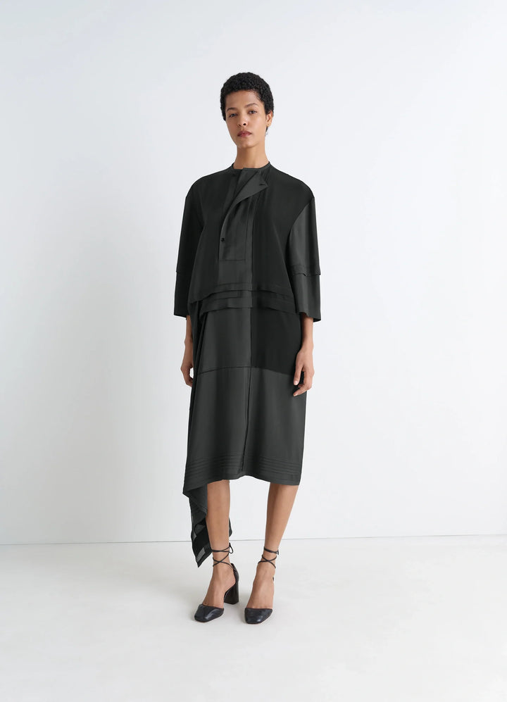 Blouse Dress with Pleats in Black crêpe de Chine, model shot, front view asymmetrical cut