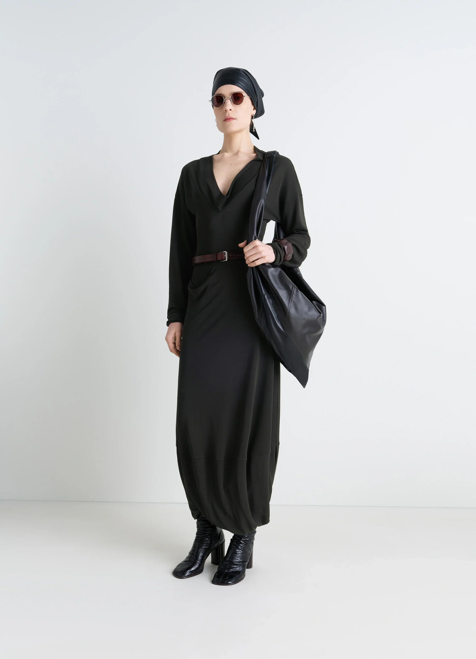 Lemaire v-neck dress in black viscose crepe jersey, model shot, front view draped elements, belted