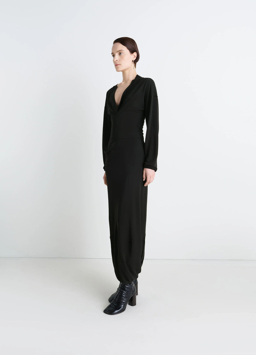 Lemaire V-Neck Dress in Black Viscose Crepe Jersey, model shot, side view asymmetrical hem