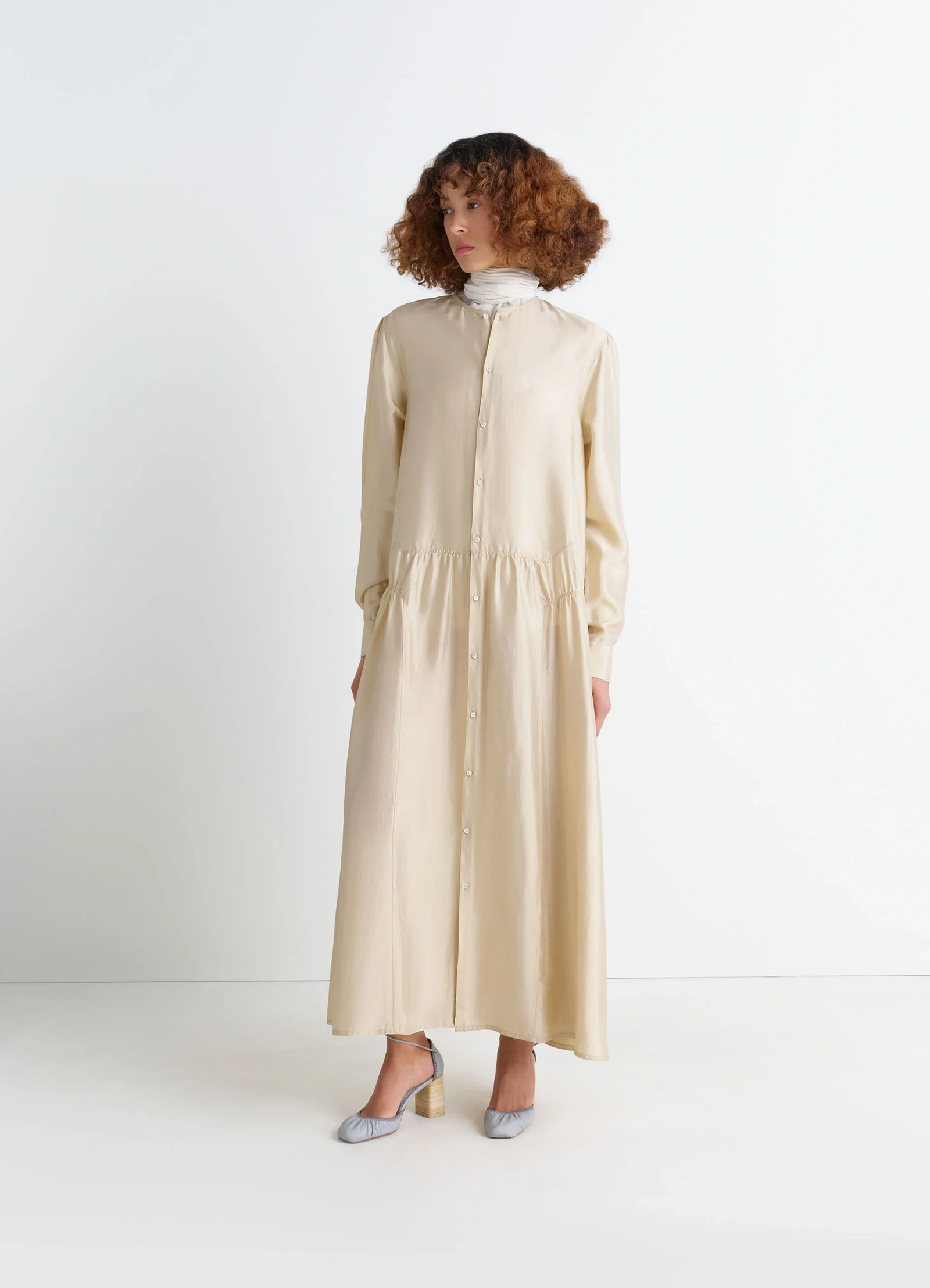 Lemaire buttoned dress in soft shiny silk, model shot, front view gathered volume