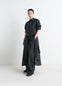 Lemaire Buttoned Dress in Silk Soft Shiny Black, model shot, Front-side view Gathered maxi volume