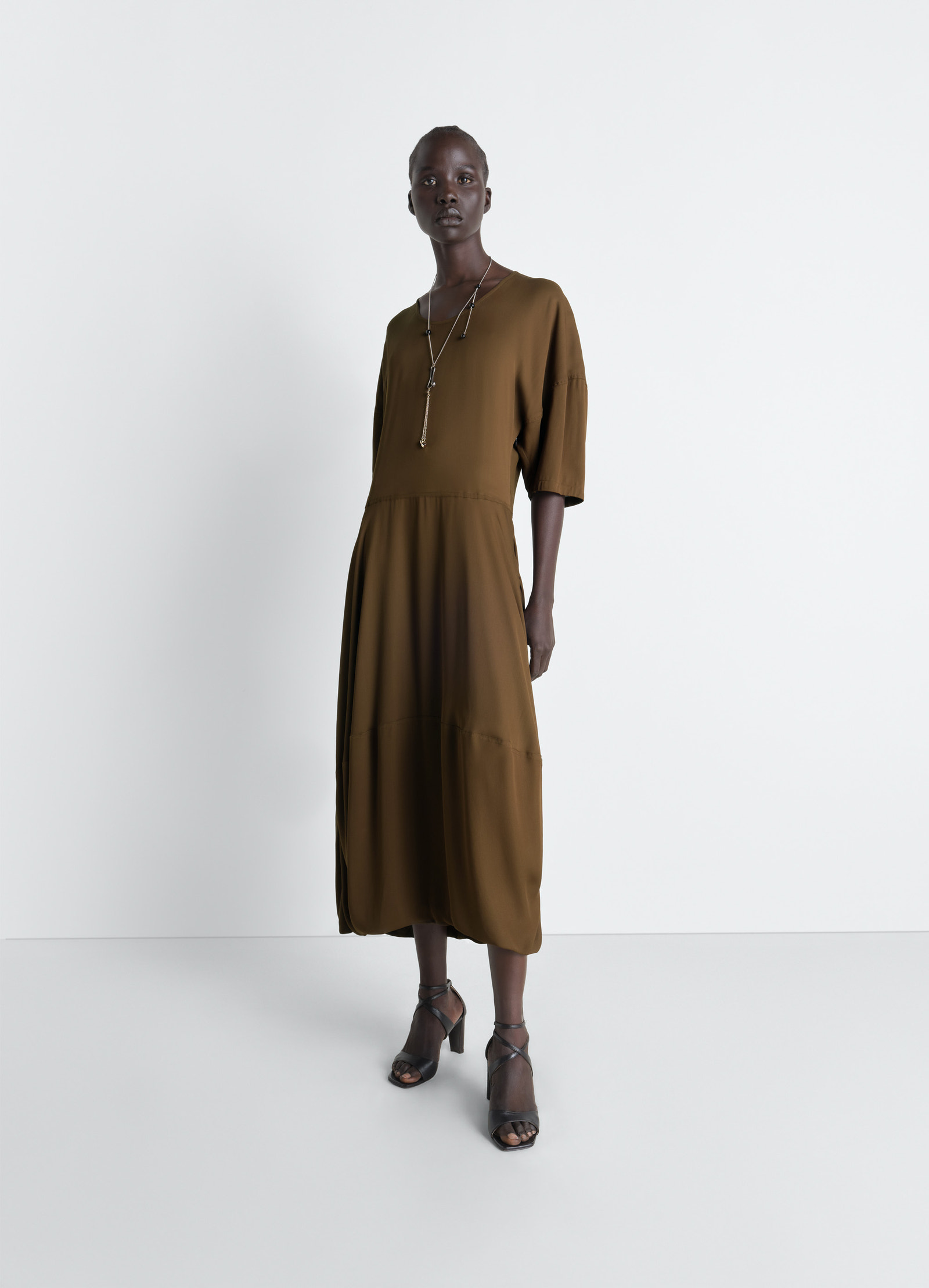 Lemaire balloon dress in crepe de chine viscose, model shot, front view rounded silhouette