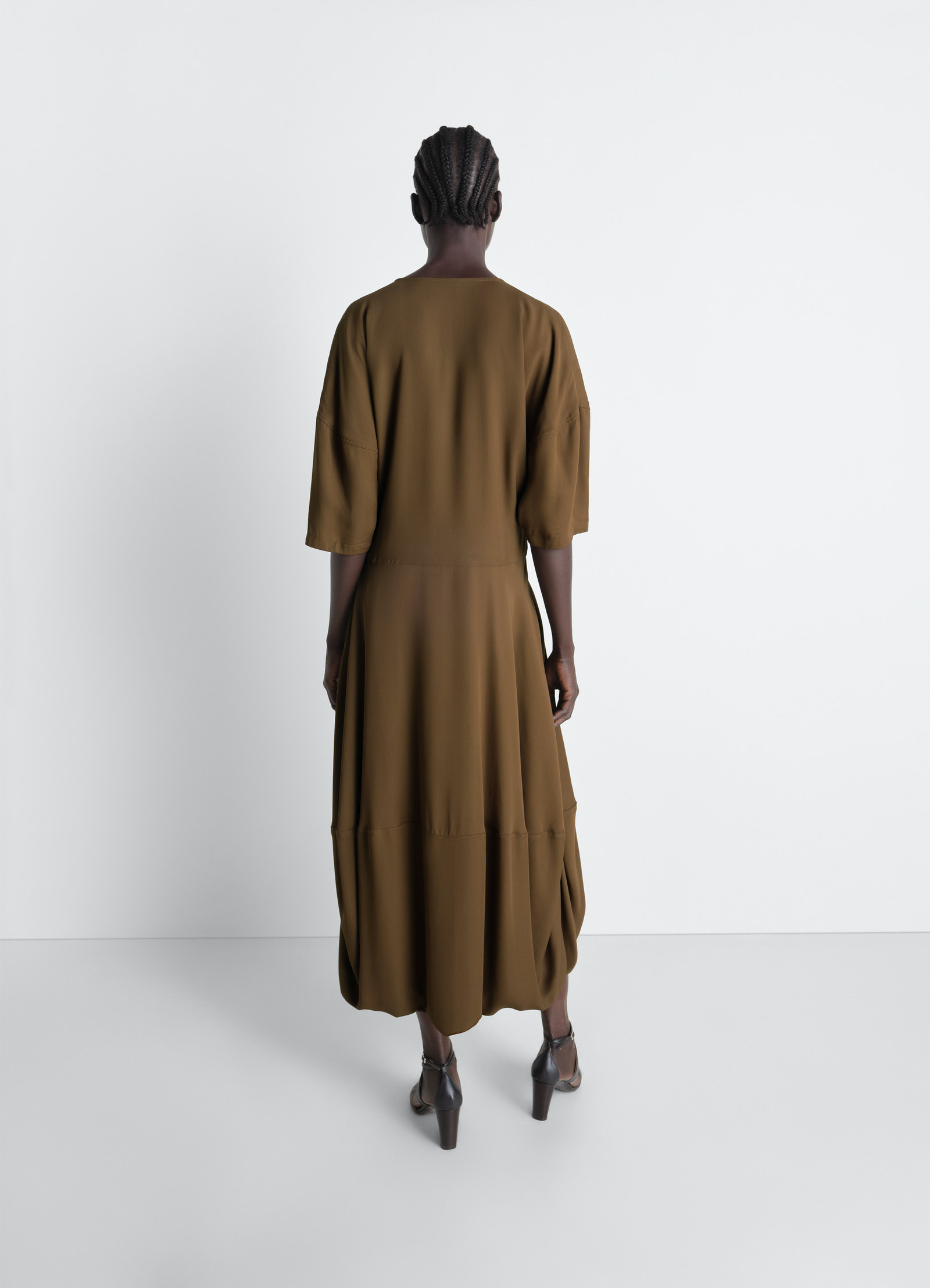 Lemaire balloon dress in crepe de chine viscose, model shot, back view drop waist hem detail
