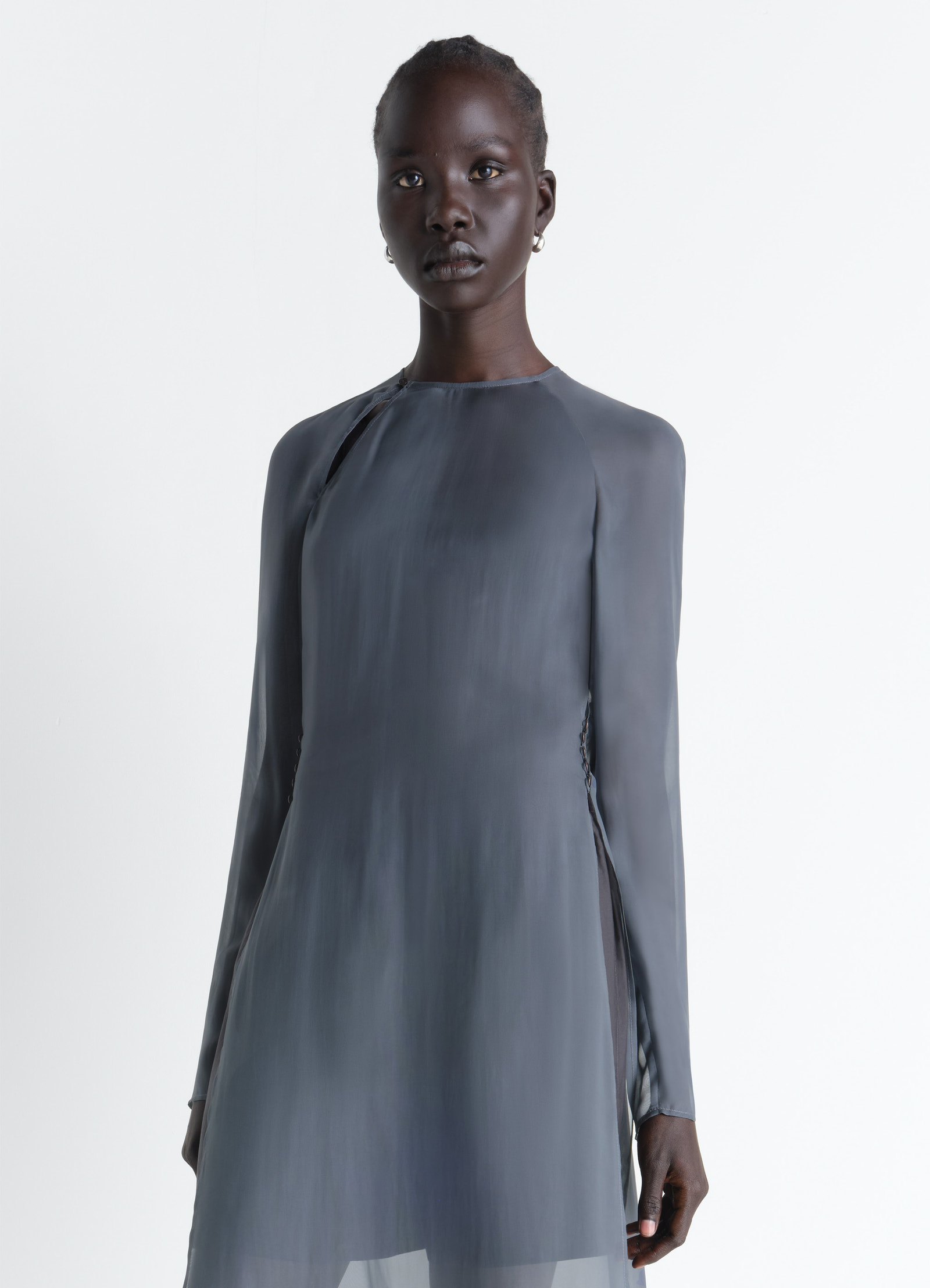 Dress with slits in transparent cup in transparent cupro, model shot, three-quarter view long sleeves sheer fabric