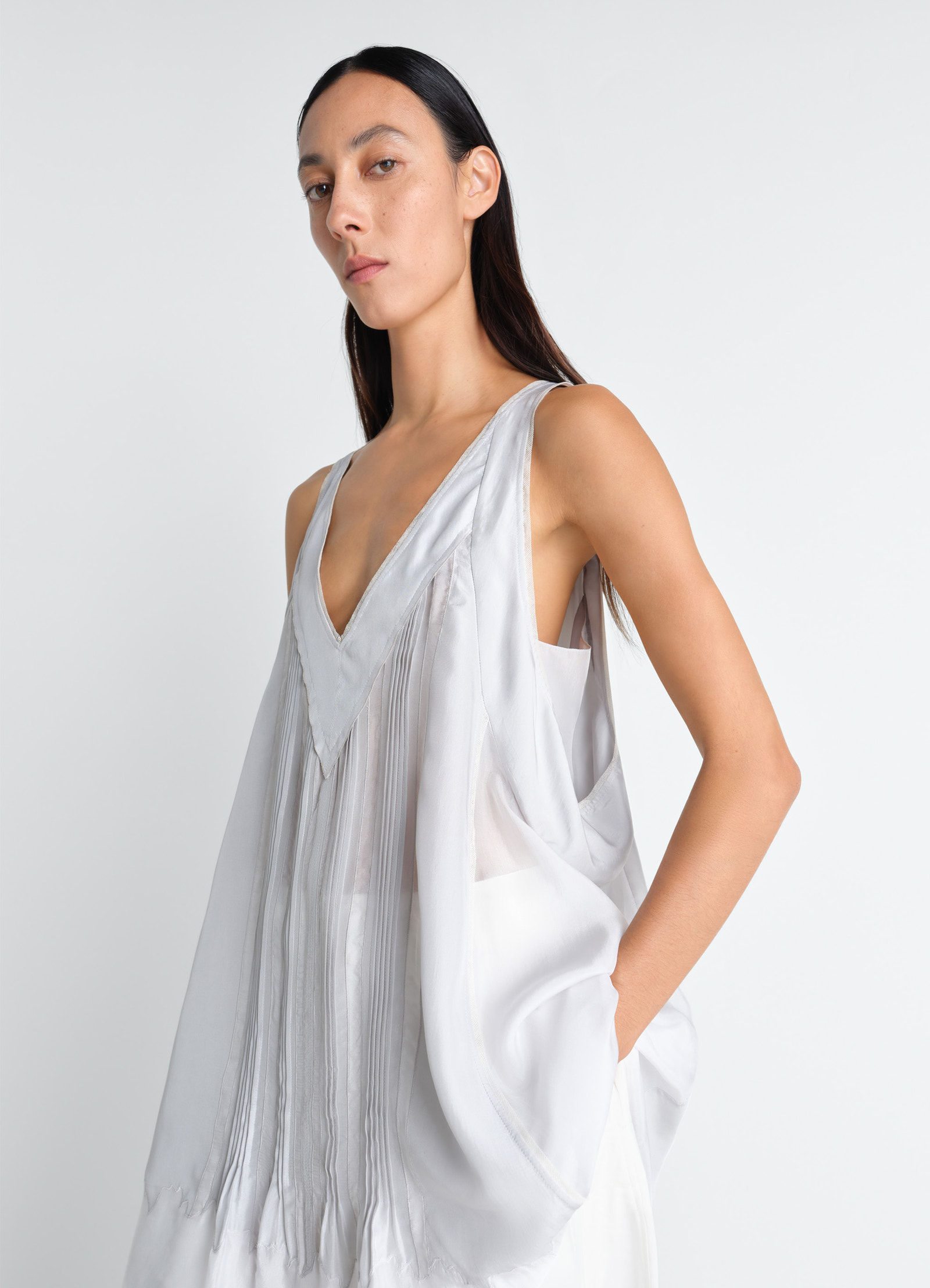 Lemaire sleep tunique dress in silk pongee, model shot, side view sleeveless loose fit