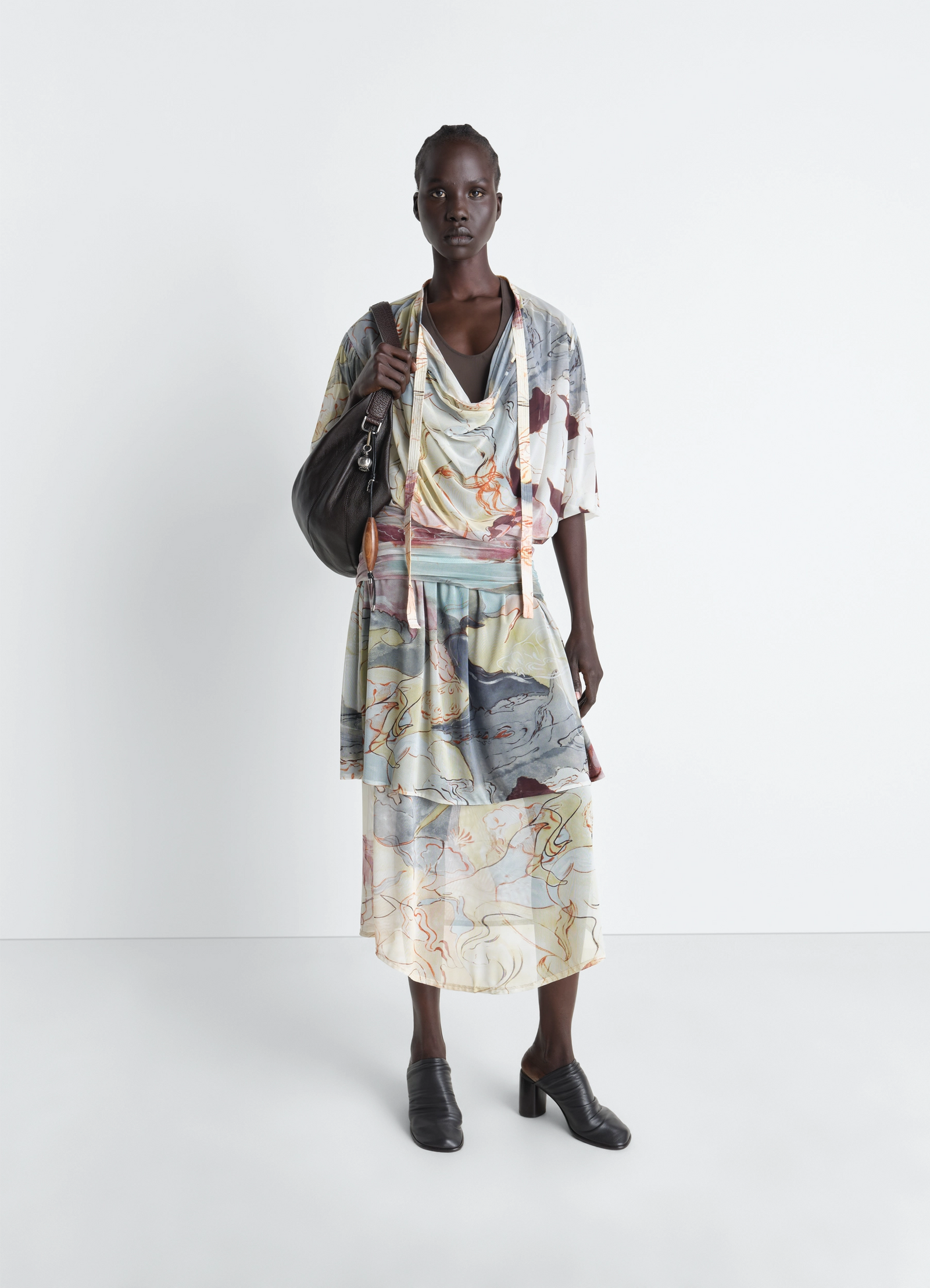 Double layer dress in mesh in colorful transparent mesh, model shot, front view draping low waist, fluid