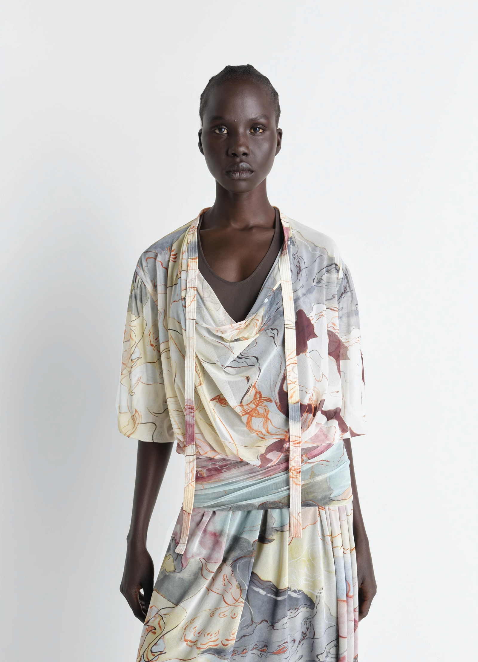 Double layer dress in mesh in colorful transparent mesh, model shot, three-quarter view draped neckline, layered skirt